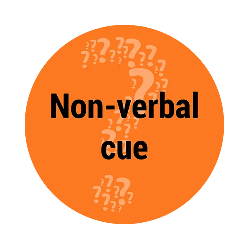 Orange graphic shaped like a stylized speech bubble with a large question mark formed by smaller question marks in the background, and the word “Non-verbal cue” written in bold black text across the center.