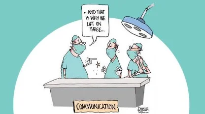 Cartoon of three surgeons around an operating table labeled "Communication," with one saying, "...and that is why we lift on three," highlighting a miscommunication issue.
